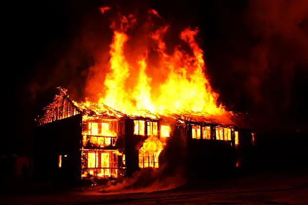 A photo of a house fire that was cause by a candle