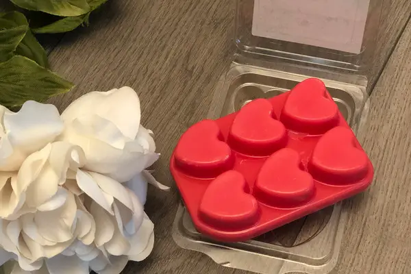 A photo of my strawberry scentedwax melts curing.