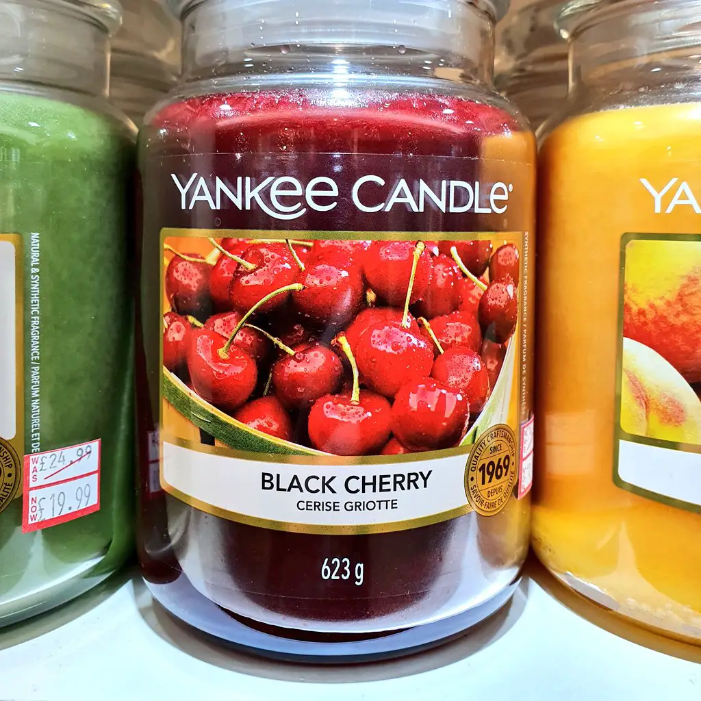A photo of a popular Yankee candle in a store