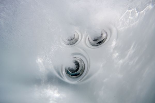 A photo of a jetted tub with bath salts in it