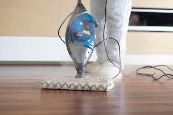 A photo of a steam mop with essential oils in it.